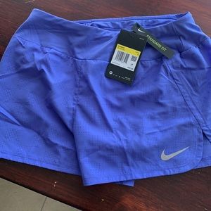 Nike sport shorts small…BNWT. Lined back pocket. Purple.
